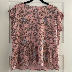 Pink sleeveless blouse